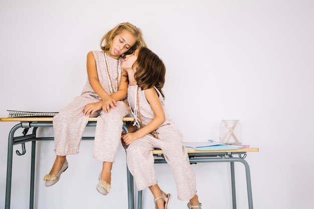 Lori and Marjorie Harvey Set Mother-Daughter Style Standards in a Dior Doodle Print Dress and Schiaparelli Lobster Skirt