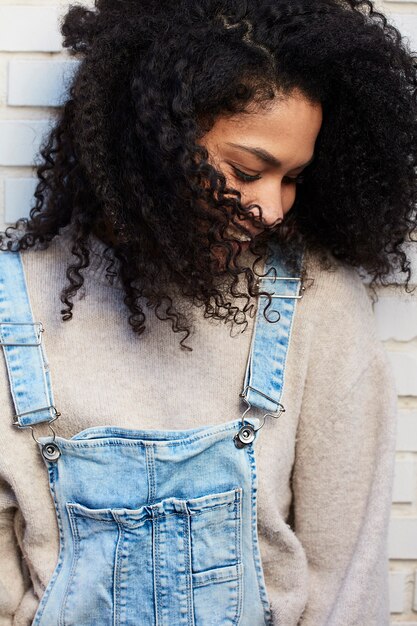 Rihanna Debuts Fenty Hair in London Wearing a Chic Jacquemus Coat, Vintage Galliano Dress, and Custom Amina Muaddi Heels