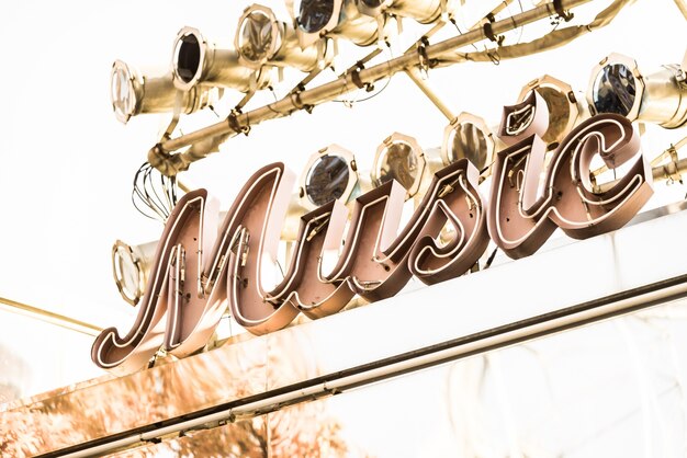 The 2025 Grammy's Style Icons: Beyonce Shines in Gold Schiaparelli, Cardi B Stuns in Multicolor Cavalli, Doechii Impresses in Pinstripe Thom Browne, and Other Top Dressed Celebrities